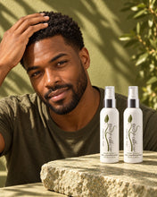 Load image into Gallery viewer, Man with a short haircut beside two Bio Follicle Normal treatment sprays